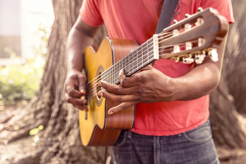 Child playing guitar